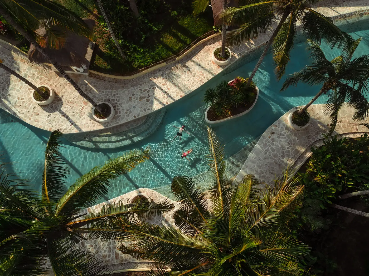 Kuara river pool from above with palms